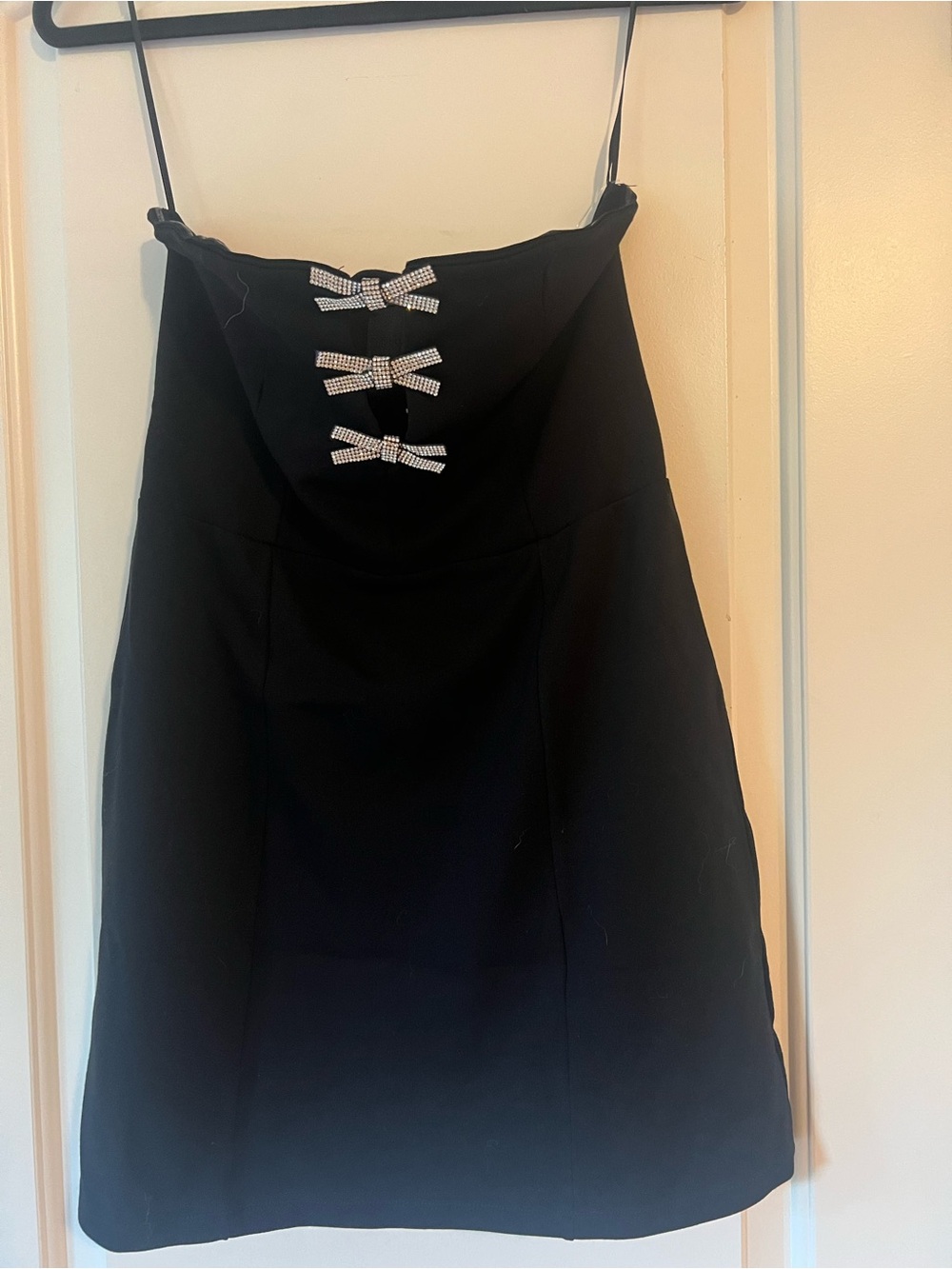Black Strapless Dress with Rhinestone Bow Accents by ALTAR’D STATE